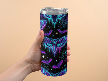 Tumbler with neon moths, bats, and spiderwebs on a black background.