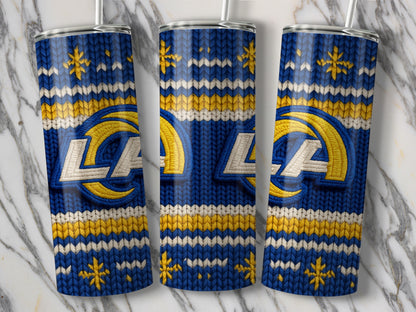 Three tumblers with Los Angeles Rams logo on a blue knit pattern.