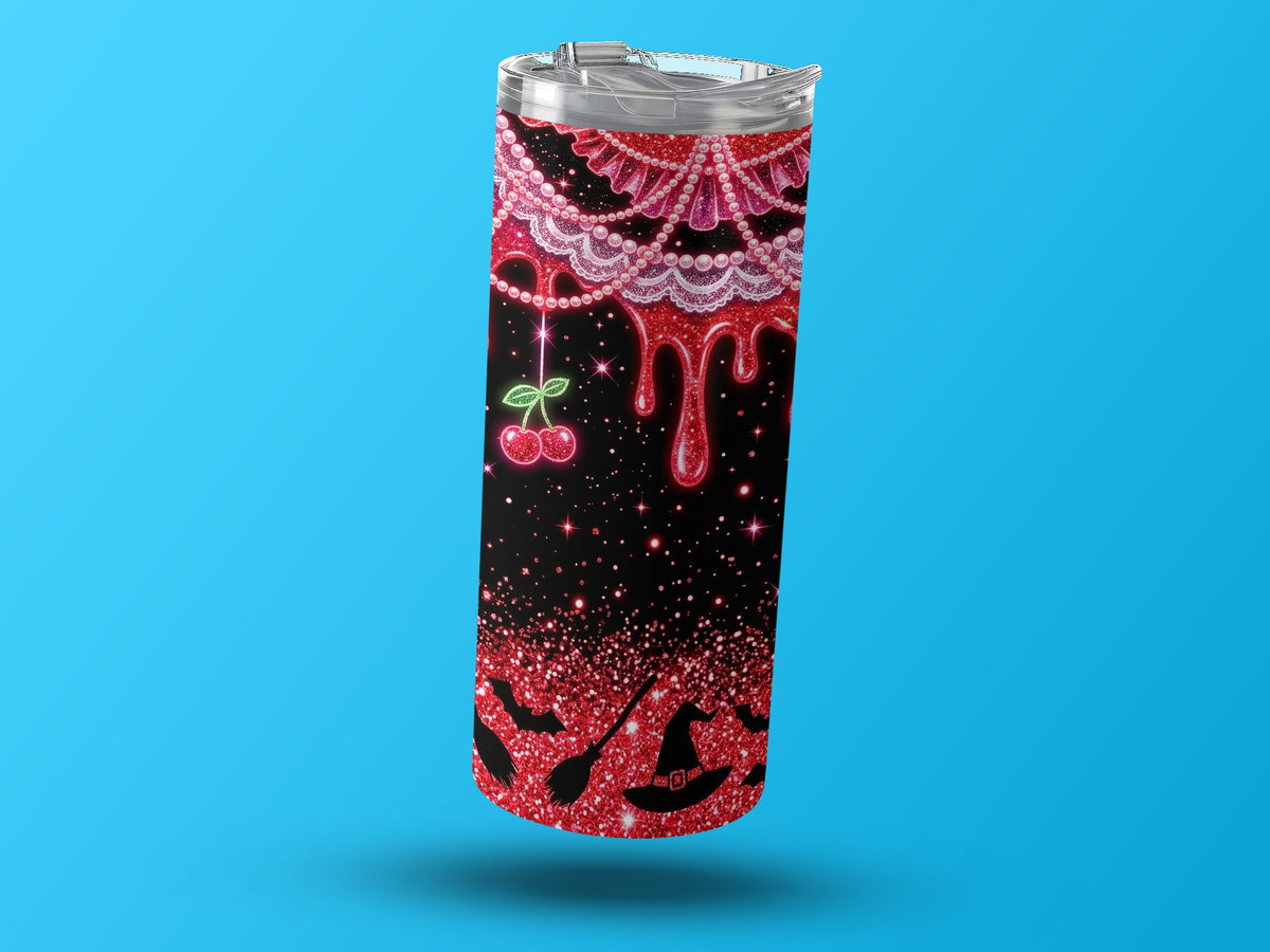 Tumbler with dripping red glitter, cherries, lace, bats, broomstick, and witch hats.