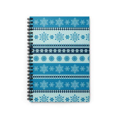 Spiral notebook with blue and teal snowflake patterns and borders.