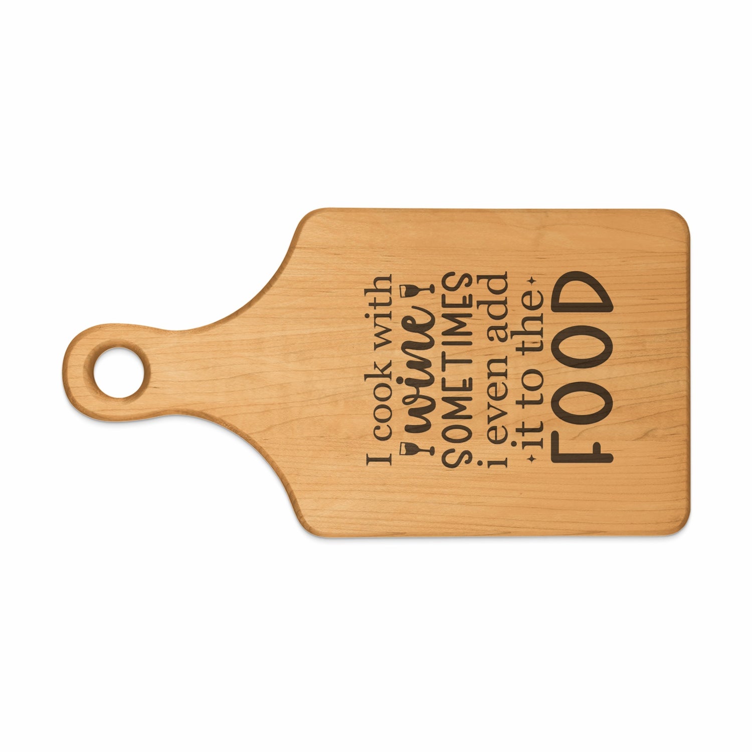 Wooden cutting board with engraved text "I cook with wine. Sometimes I even add it to the food."