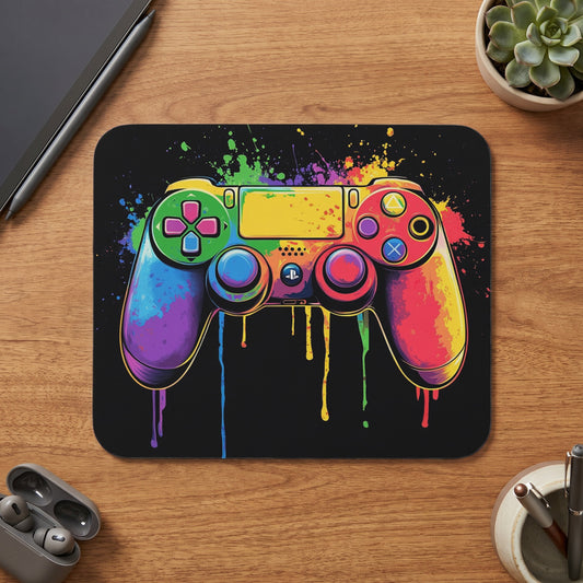 Colorful, dripping paint video game controller on black background, top view.