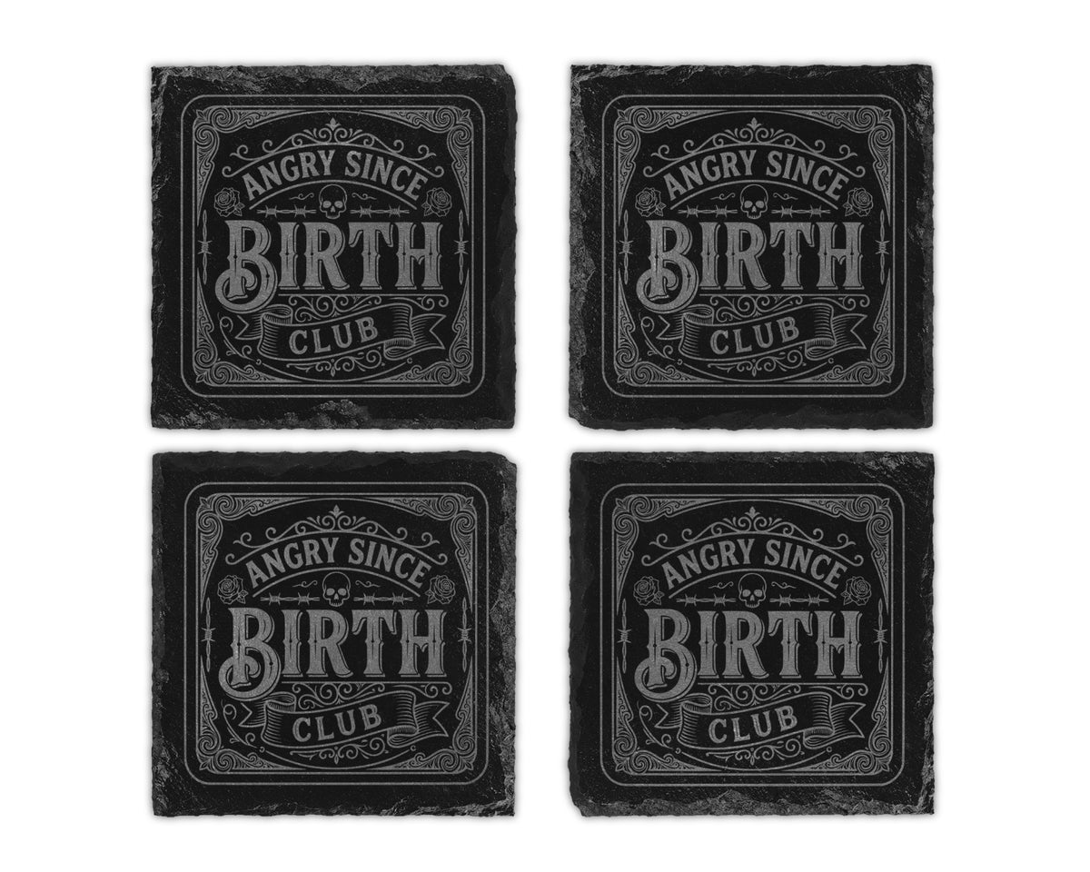 Four square slate coasters engraved with "Angry Since Birth Club".