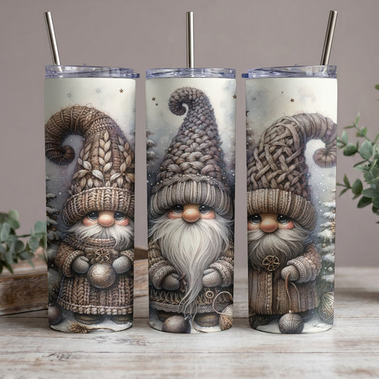 Three tumblers with winter gnome art, wearing knitted hats and sweaters.