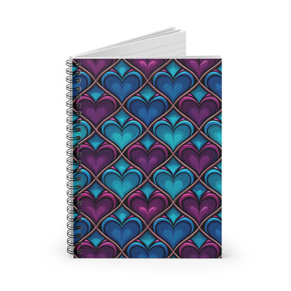 Spiral-bound notebook with a repeating pattern of purple and blue hearts.