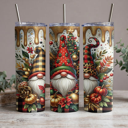 Three tumblers featuring gnomes, pumpkins, and festive holiday designs.