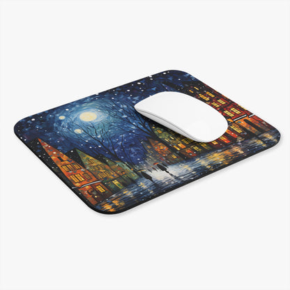 Mousepad with a moonlit, snowy city scene featuring buildings and figures with umbrellas.