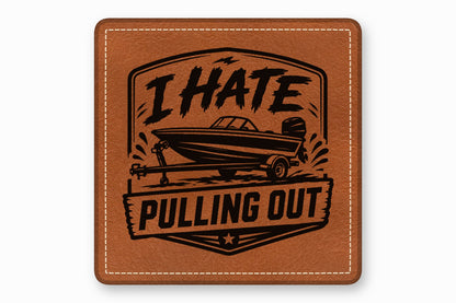 Square brown leatherette patch featuring stitched edges and black engraved text reading I HATE PULLING OUT above a motorboat on a trailer.