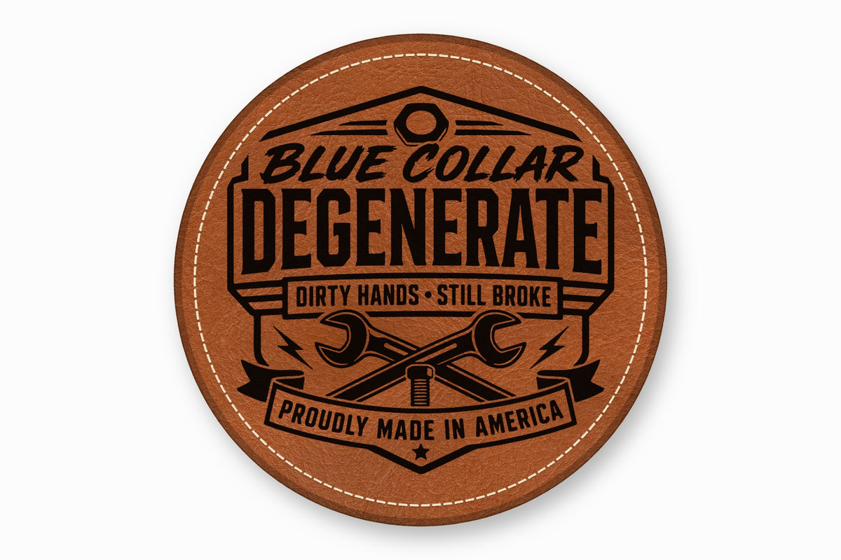 Round brown leather patch with white stitched border, featuring black text and crossed wrenches.