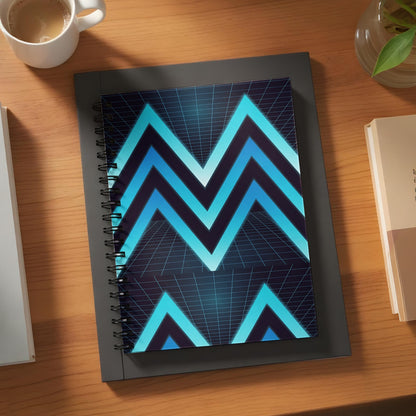 Spiral notebook with blue and black chevron pattern on a grid background.