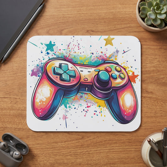 Colorful video game controller with paint splatters and stars.