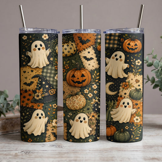 Three tumblers with a patchwork Halloween design featuring ghosts, pumpkins, and bats.