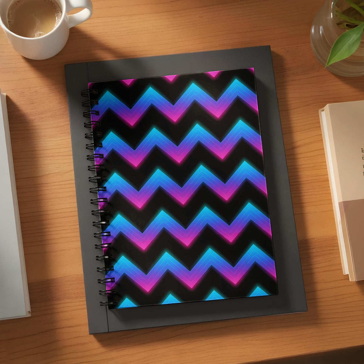 Spiral bound notebook with glowing neon zigzag pattern.