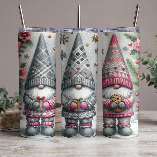 Three gnomes in knitted hats and sweaters holding gifts and a cookie.