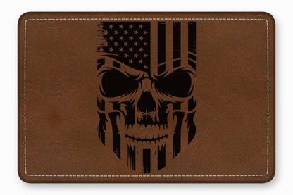 Rectangular brown leather patch featuring a distressed black American flag skull graphic and white stitching.