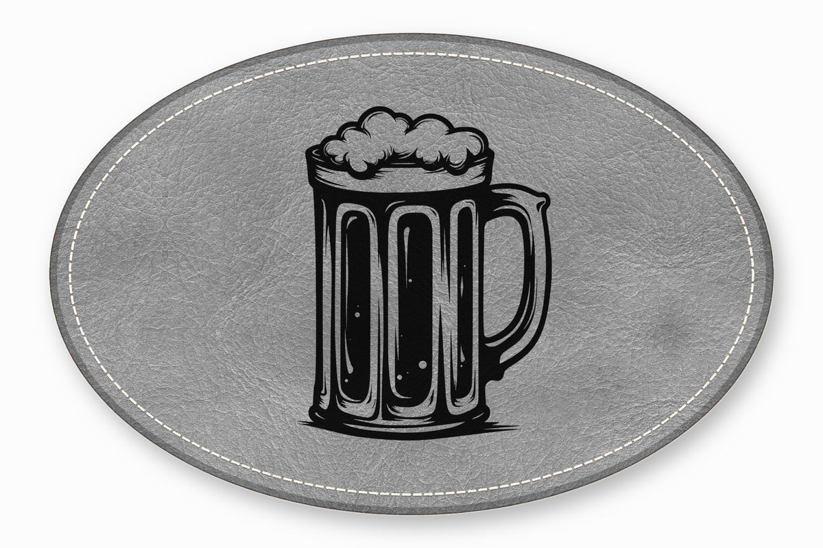 An oval gray leather patch featuring a black embroidered beer mug design.