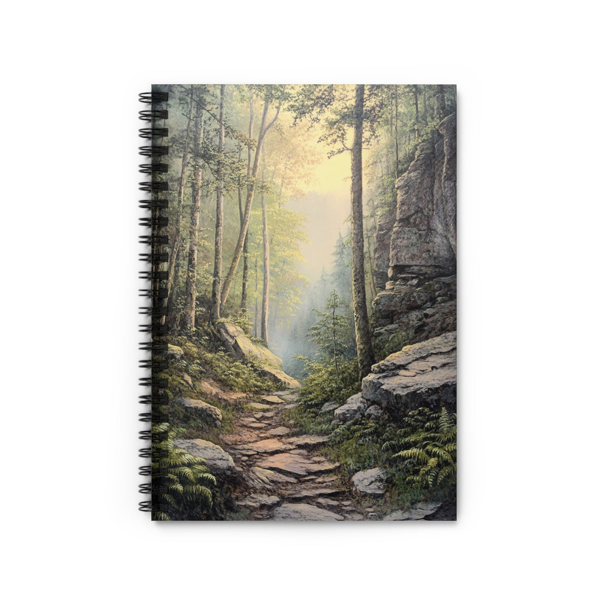 Notebook with a forest path artwork on cover, sunlight breaking through trees.