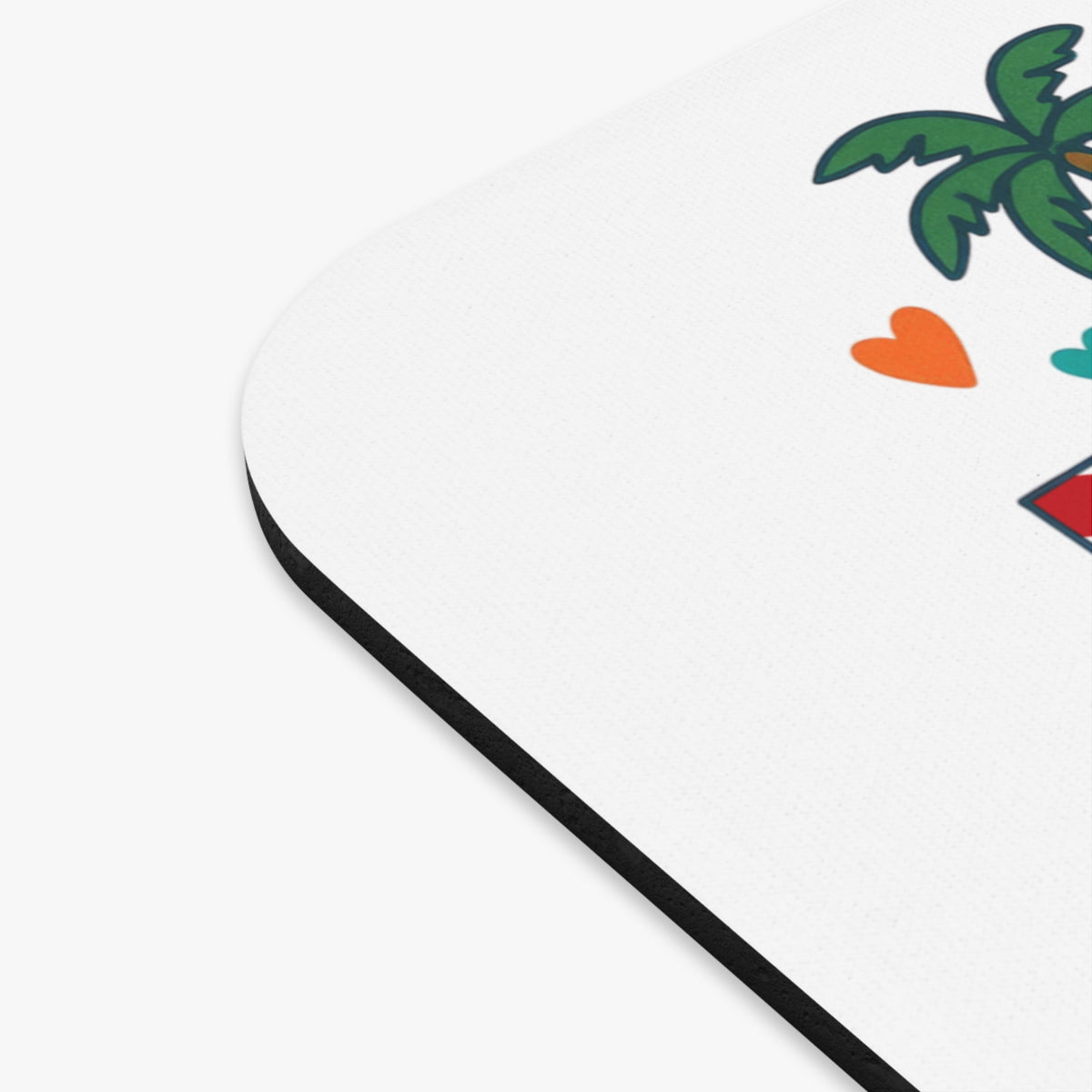 White mousepad with a cartoon palm tree, heart, and square design.