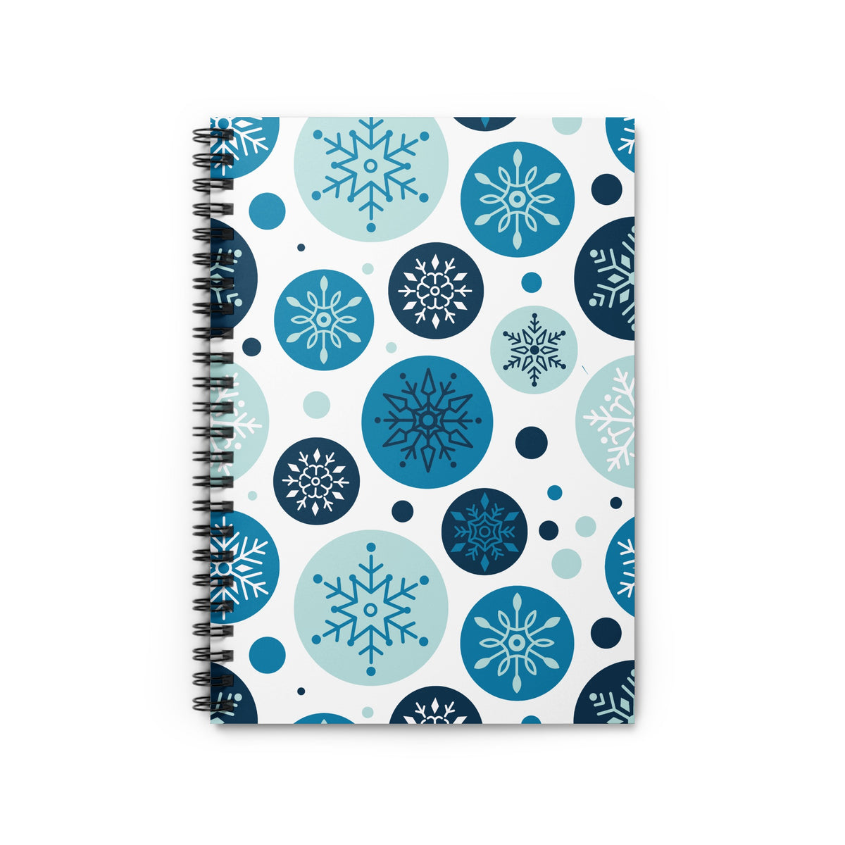 Spiral notebook with a blue and white snowflake pattern on the cover.