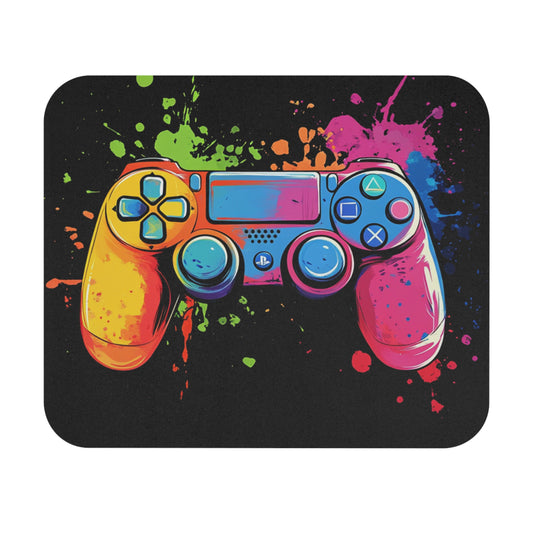 Colorful video game controller with paint splatters on black background.