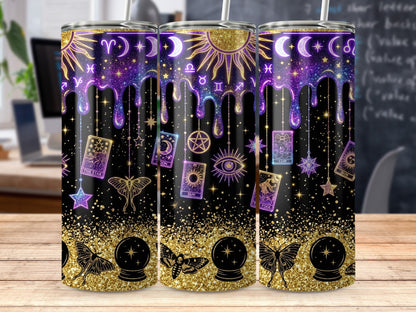 Celestial-themed tumbler with sun, moon, stars, tarot cards, eye, and moths.