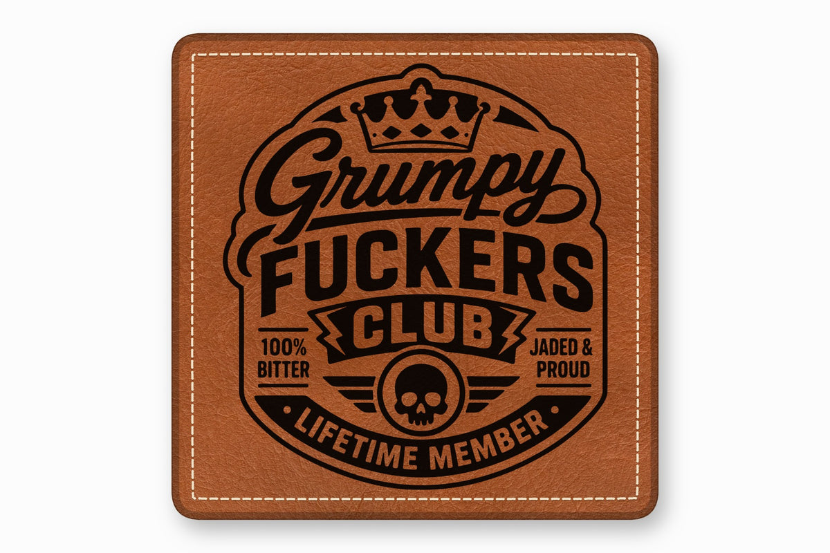 Brown leather patch featuring a black stamped emblem with a crown, skull, and text.