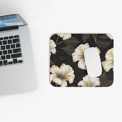 Mousepad with a black background and a gold and white hibiscus floral pattern.