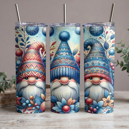 Three gnomes with patterned hats and winter ornaments on tumblers.