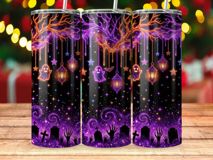 Three tumblers with Halloween glitter designs of ghosts, lanterns, and gravestones.