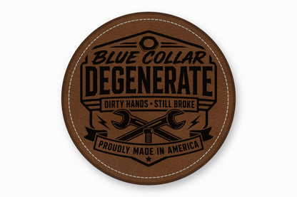 Round brown leather patch with white stitched border and black stamped text reading Blue Collar Degenerate.
