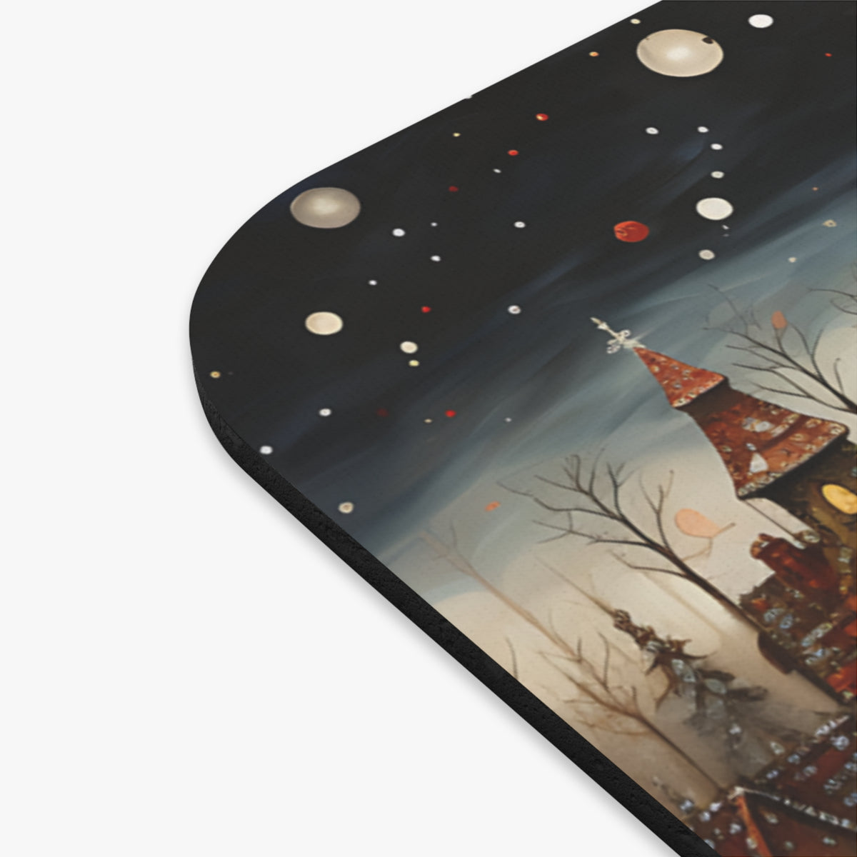 Whimsical haunted house and bare trees under a starry night sky.
