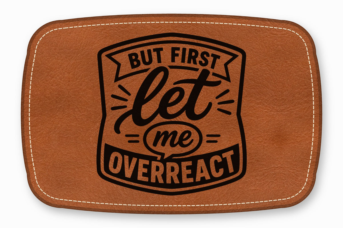Brown leather patch with white stitching and black text reading But first let me overreact.