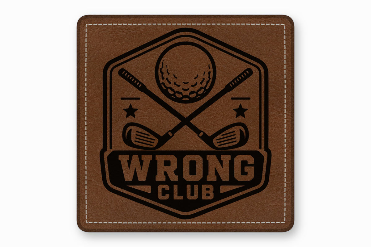 Brown leather patch with rounded corners, white stitching, and a black golf-themed design reading WRONG CLUB.