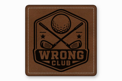 Brown leather patch with rounded corners, white stitching, and a black golf-themed design reading WRONG CLUB.