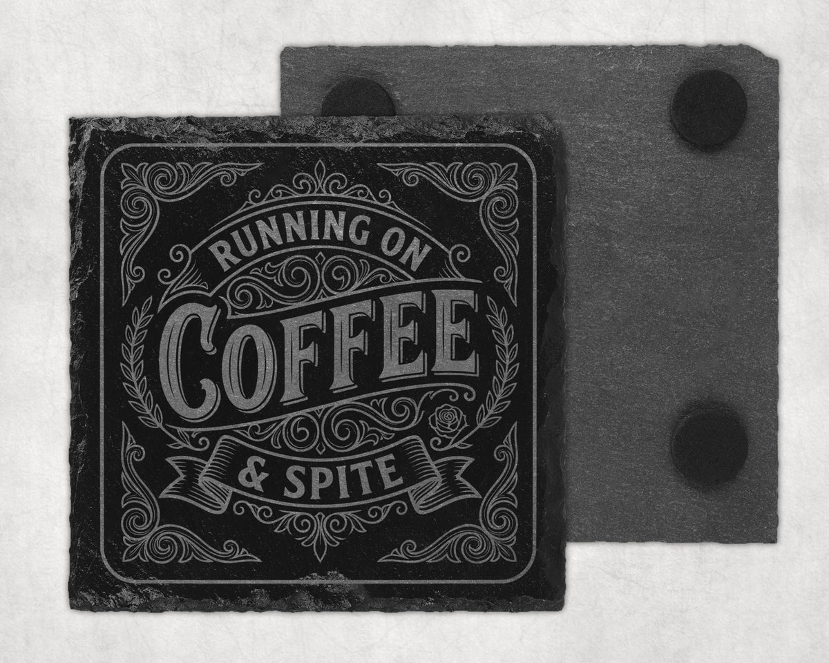 Slate coaster with text "RUNNING ON COFFEE & SPITE" and ornate border.