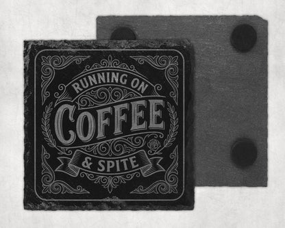 Slate coaster with text "RUNNING ON COFFEE & SPITE" and ornate border.