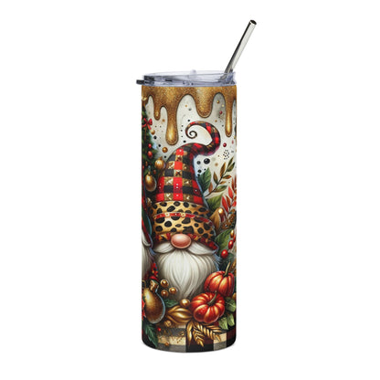 Gnome with holiday decorations on a festive tumbler with gold dripping lid and straw.