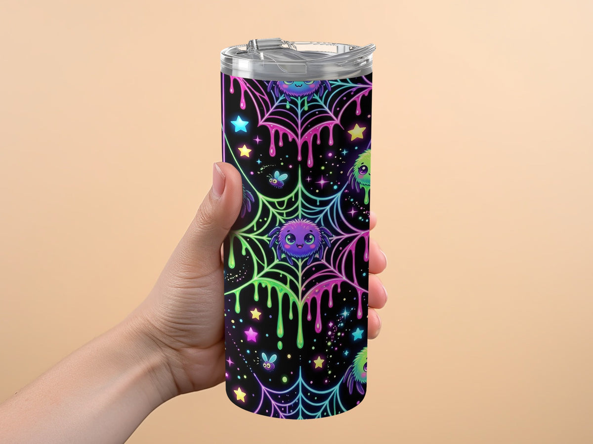 Tumbler with colorful neon spiderwebs, cute spiders, and stars pattern.