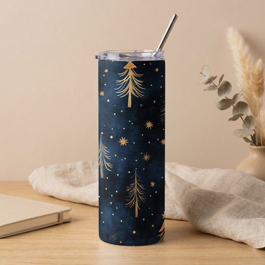 Dark blue tumbler with gold Christmas trees and stars, featuring a silver straw.