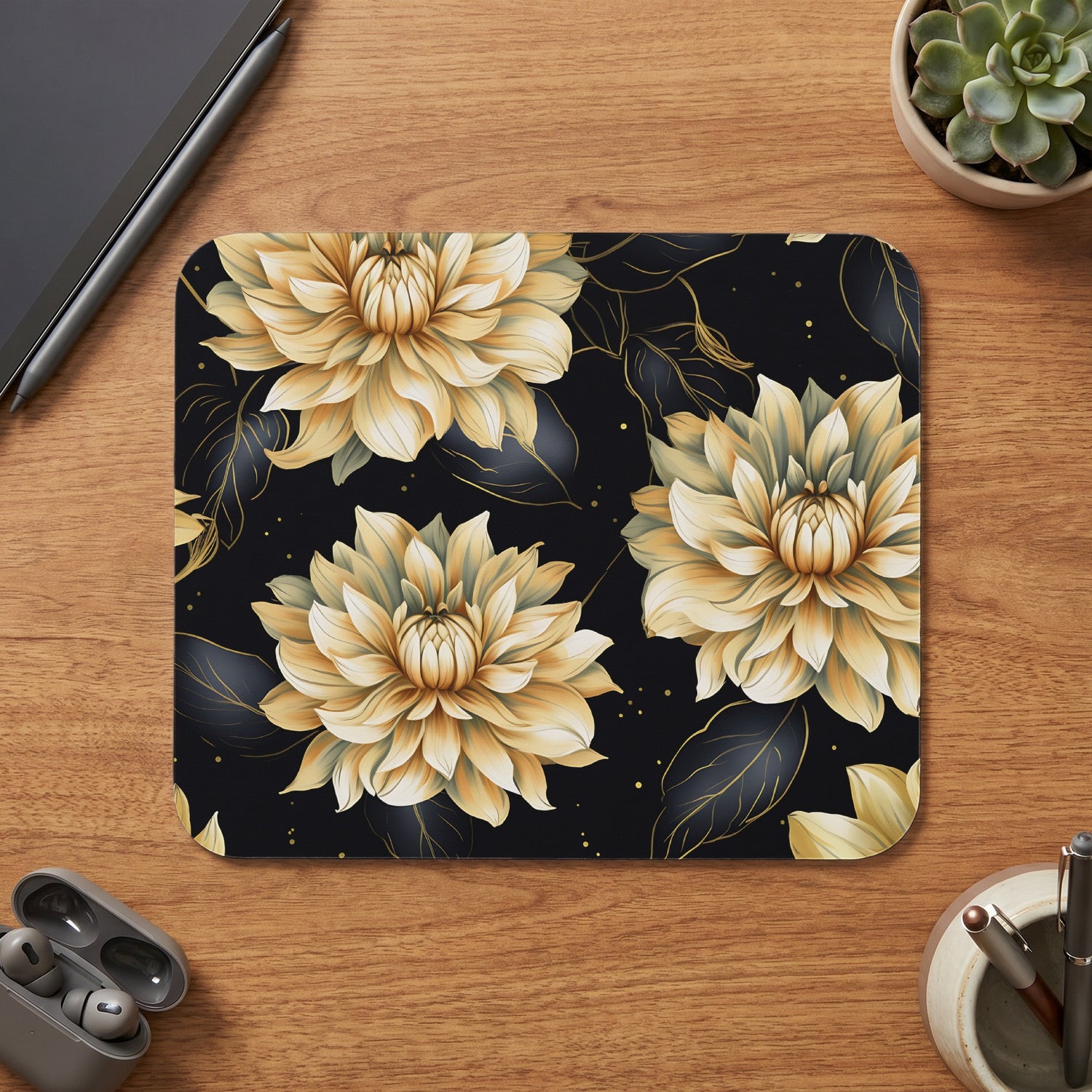 Floral pattern mousepad with gold dahlias on a black background.