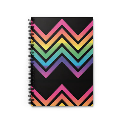 Spiral-bound notebook with a black cover featuring a rainbow chevron pattern.