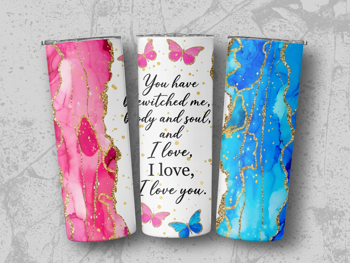 Tumblers with pink and blue marble designs, and text "You have bewitched me".