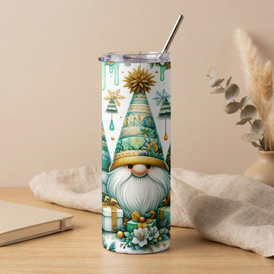 Tall tumbler with a gnome, gifts, and festive decorations, featuring a metal straw.