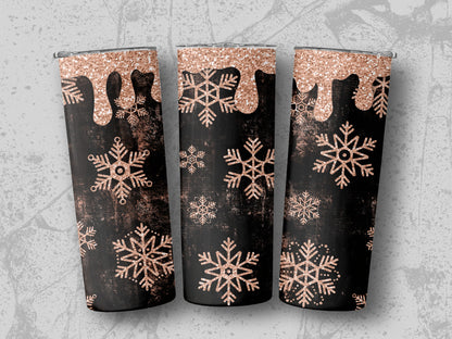 Three tumblers with a black, distressed background and rose gold glitter snowflake design.