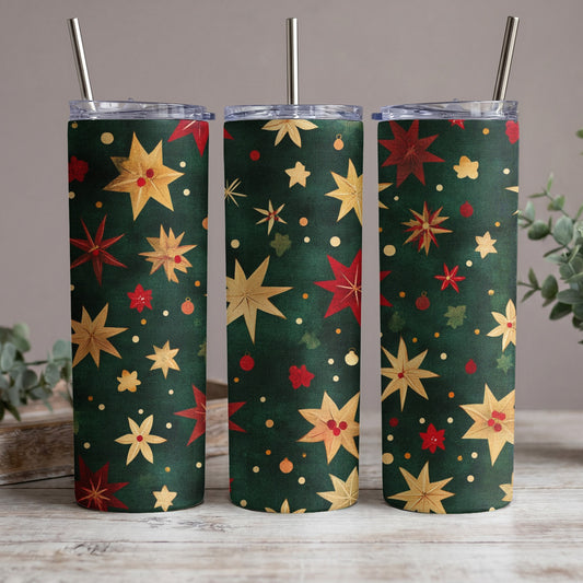Three tumblers with a dark green background and a festive red and gold star pattern.