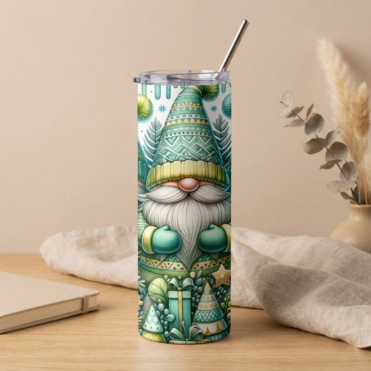 Green gnome with patterned hat and mittens on a tumbler, with gifts.
