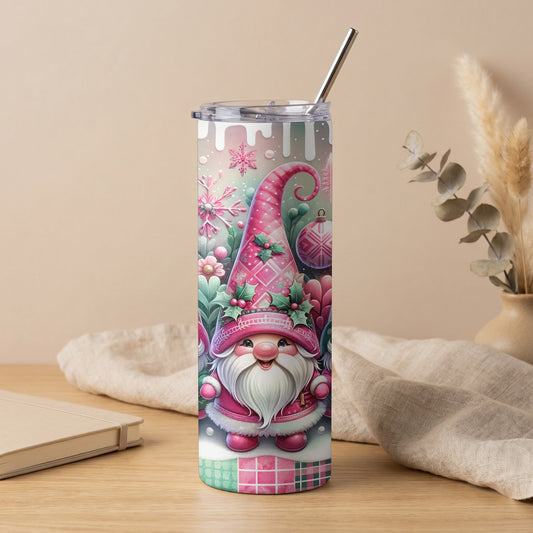 Tumbler with pink gnome, snowflakes, and Christmas ornaments.