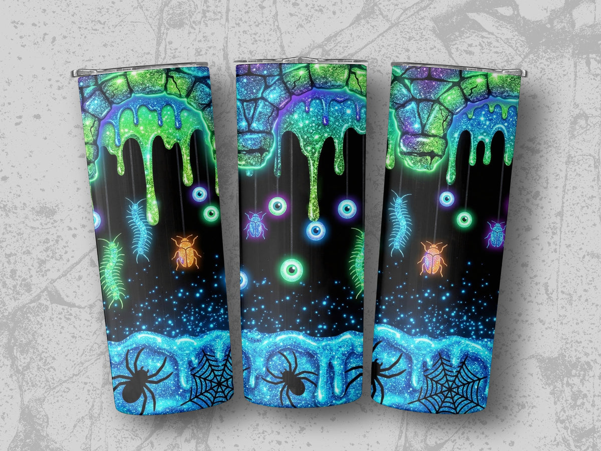 Tumblers with Halloween slime, bugs, eyeballs, spiders, and cobwebs.