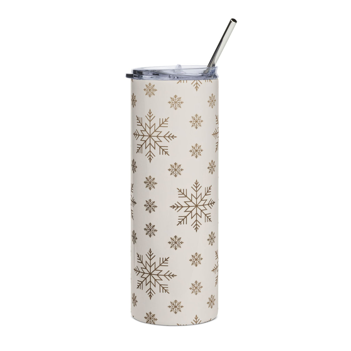 Tall tumbler with a snowflake pattern and a metal straw.