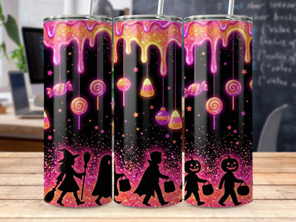 Halloween tumbler with dripping candy, stars, and trick-or-treaters silhouettes.